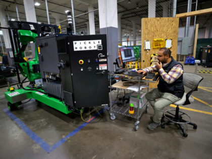 Pickle Robot software engineer David Mercado works at his station. (Photo by David L. Ryan