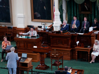 Witness attorney Brandon Cammack, center, testifies during the impeachment trial for Texas