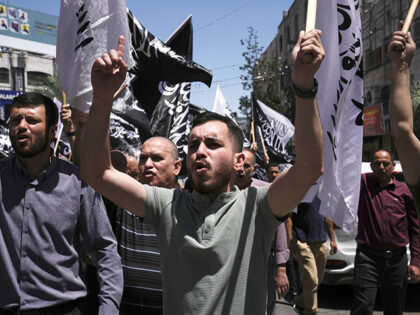 Hundreds of Palestinians march to call on Arab states to intervene to save the Gaza Strip,