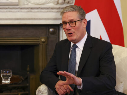 British Prime Minister Keir Starmer speaks with Qatar's Emir Sheikh Tamim bin Hamad a