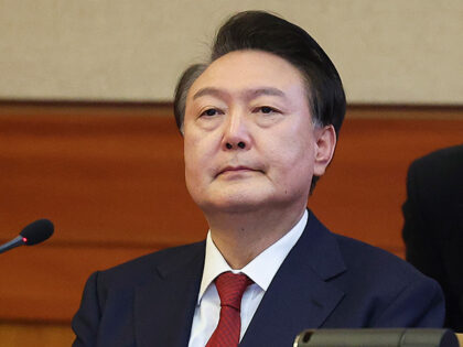 Impeached South Korean President Yoon Suk Yeol attends his impeachment trial at the Consti