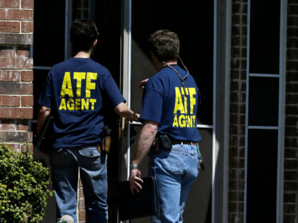 ATF agents walk into the home of Kaufman District Attorney Mike McLelland Monday, April 1,