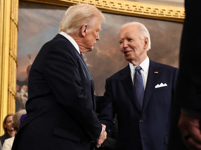 US President-elect Donald Trump greets outgoing President Joe Biden as he arrives for inau