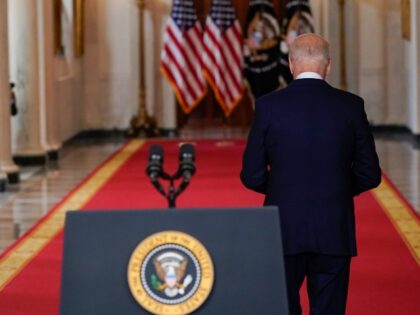 President Joe Biden walks from the podium after speaking about the end of the war in Afgha