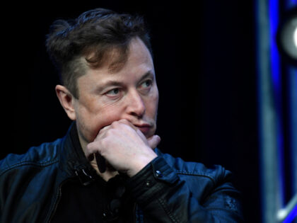 FILE - Tesla and SpaceX chief executive officer Elon Musk listens to a question as he spea