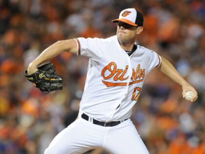 BALTIMORE, MD - AUGUST 19: Brian Matusz #17 of the Baltimore Orioles pitches against the N