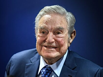 Hungarian-born US investor and philanthropist George Soros smiles after delivering a speec