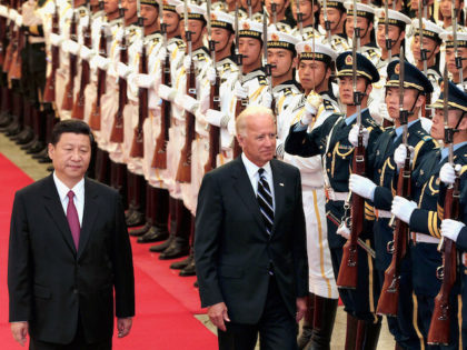 In this August 2011 file photo, then Vice President Xi Jinping accompanies then Vice Presi