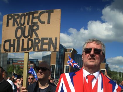 TELFORD, ENGLAND - MAY 07: Supporters of Tommy Robinson and his child grooming documentari