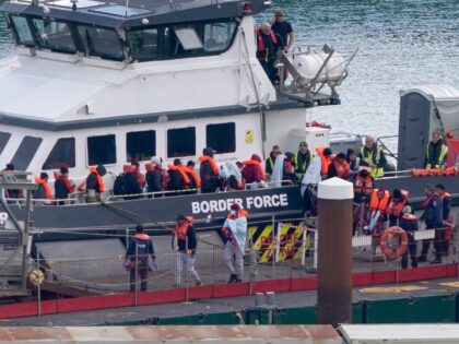 A group of people thought to be migrants are brought in to Dover, Kent, from a Border Forc