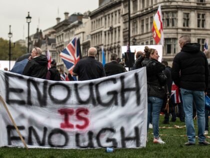 LONDON, UNITED KINGDOM - 2024/10/26: A banner that says "Enough is Enough" is seen during