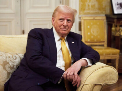 PARIS, FRANCE - DECEMBER 7: President-Elect Donald Trump reacts during his meeting with P