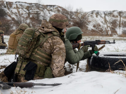 KHARKIV REGION, UKRAINE - DECEMBER 07: Civilians attend the firearms training as part of t