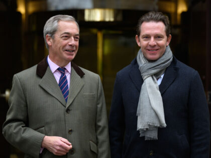 LONDON, ENGLAND - DECEMBER 10: Reform UK leader Nigel Farage (L) poses with Billionaire Ni