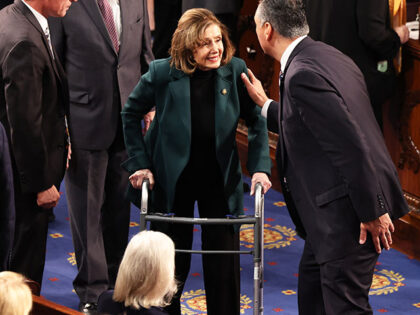 U.S. Rep. Nancy Pelosi (D-CA) uses a walker as she arrives for a joint session of Congress