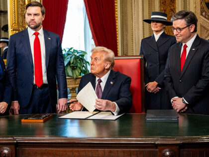 US President Donald Trump, center, during a signing ceremony in the President's Room durin