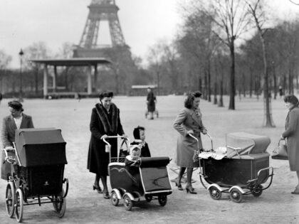 FRANCE - 1944: War 1939-1945. Housewives walking their babies. Paris, on 1944. Roger Violl