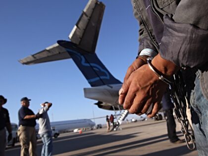 MESA, AZ - JUNE 24: An undocumented Guatemalan immigrant, chained for being charged as a c