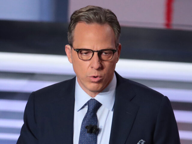 CNN moderator Jake Tapper speaks to the crowd attending the Democratic Presidential Debate