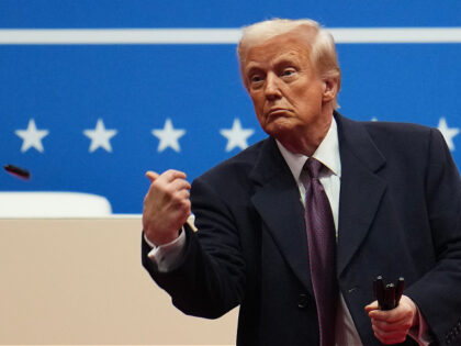 WASHINGTON, DC - JANUARY 20: U.S. President Donald Trump throws a pen after signing execut