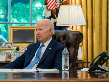 President Joe Biden listens to a question during an interview with the Associated Press in