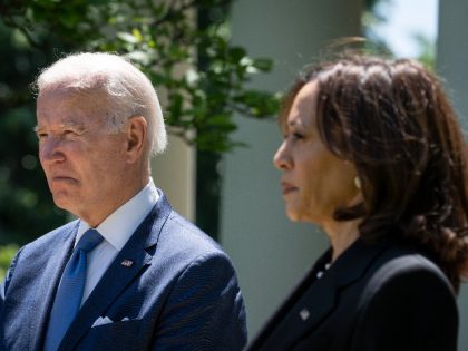 U.S. President Joe Biden and Vice President Kamala Harris listen to speakers during an eve