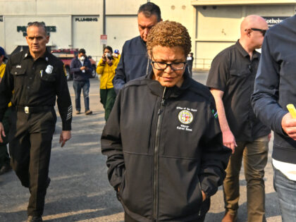 Los Angeles Mayor Karen Bass, chats with California Governor Gavin Newsom while surveying