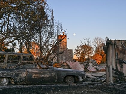 LOS ANGELES, CA - JANUARY 12: A view of debris of burned houses and cars in Pacific Palisa