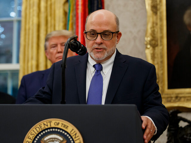 Mark Levin speaks, with President Donald Trump behind him, during a ceremony to present th