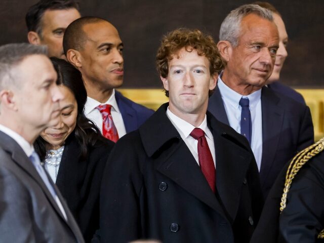 Mark Zuckerberg stands with RFK Jr