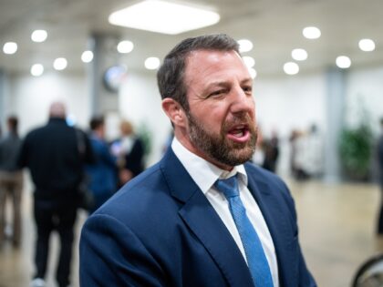 WASHINGTON - DECEMBER 6: Sen. Markwayne Mullin, R-Okla., speaks to reporters as he arrives