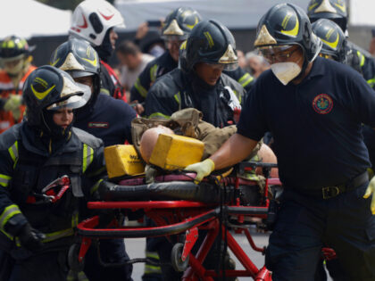 Members of the Heroic Fire Brigade participate in the National Drill 2024 in Mexico City,