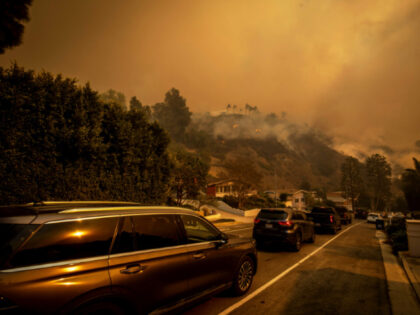 People Abandon Cars in Fire