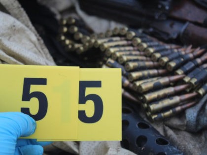 Weapons and ammunition colledted during a crime scene attributed to the Sinaloa Cartel. (C