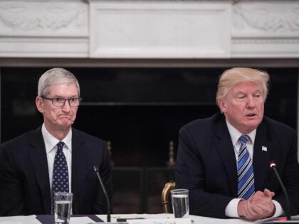 Tim Cook makes a bizarre face as Donald Trump speaks