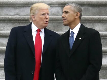 FILE - In this Friday, Jan. 20, 2017, file photo, President Donald Trump talks with former