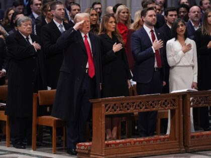 President Donald Trump, from left, salutes alongside first lady Melania Trump, Vice Presid