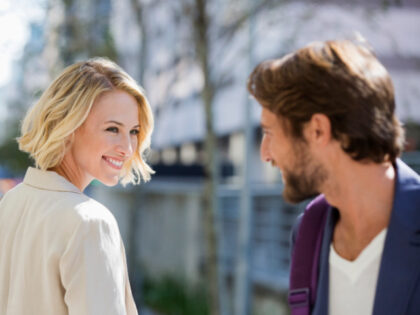 Man and Woman Smiling at Each Other